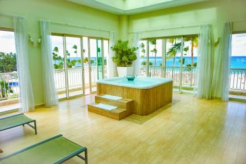 Spacious, bright veranda with jacuzzi and ocean views Stock Photos