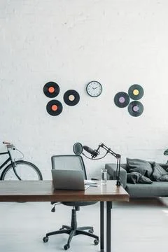 Spacious broadcasting studio microphone laptop Stock Photos