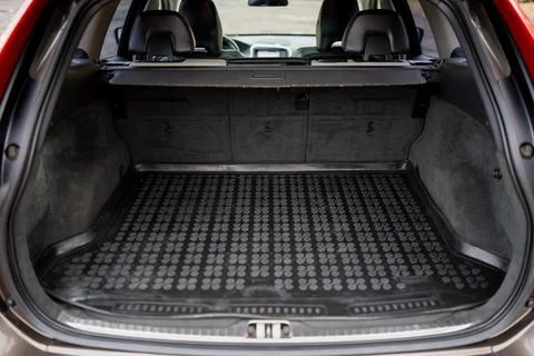 Spacious car trunk with protective rubber cargo mat Stock Photos