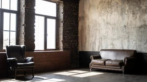Spacious empty loft room with large windows Foto stock