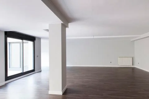Spacious empty room of modern cottage Stock Photos