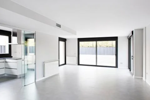 Spacious empty room of modern cottage Stock Photos