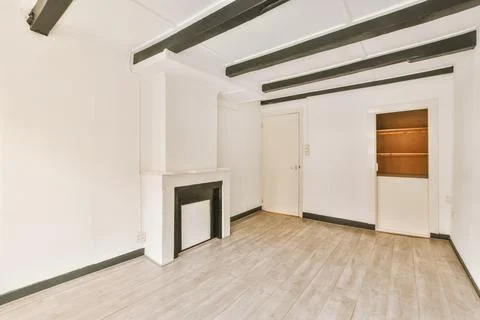 Spacious empty room in white tones Stock Photos