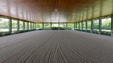 Spacious empty squad for horse riding with clear adjusted sand instead of floor Stock Footage 245629163