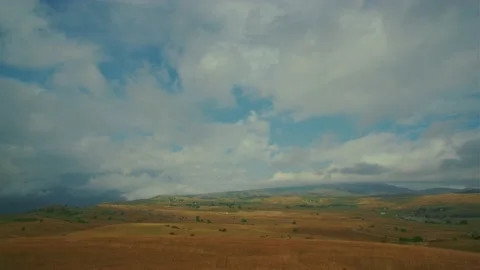 Spacious fields with yellow grass Stock Footage 167694970