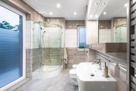 Spacious high gloss bathroom idea Stock Photos