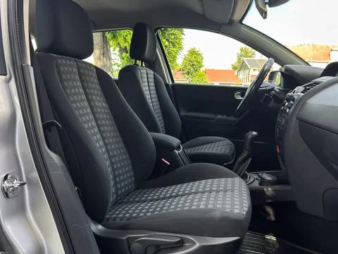 A spacious interior of a modern compact car showcasing comfortable seating an Stock-Fotos
