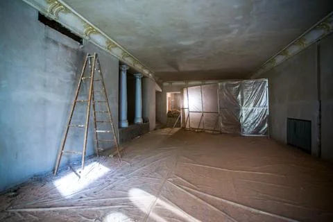 The spacious interior of the old mansion during the restoration work. Stock Photos