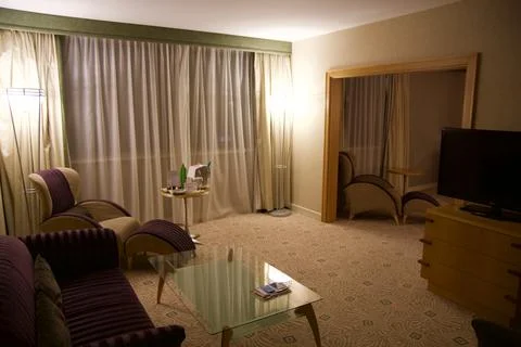Spacious luxury hotel suite with separate living and sleeping areas Stock Photos