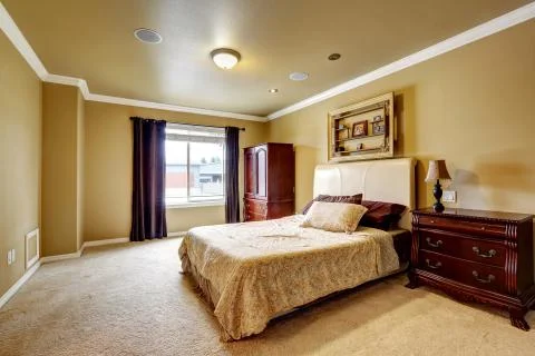 Spacious master bedroom interior Stock Photos