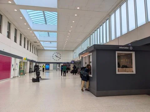 Spacious modern concourse of Glasgows Buchanan Bus Station with passengers and Stock Photos