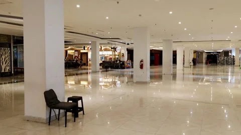 Spacious Modern Shopping Mall Interior With Bright Lighting and Open Design Vídeos de archivo 305526938