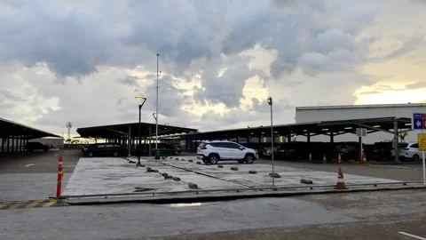 A spacious parking area featuring shaded parking spaces Stock Footage 304064478