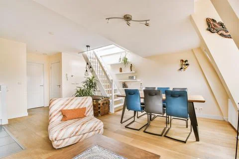 Spacious room with various areas Stock Photos