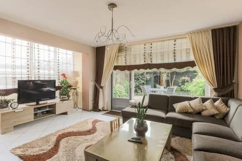 Spacious room with various areas Stock Photos