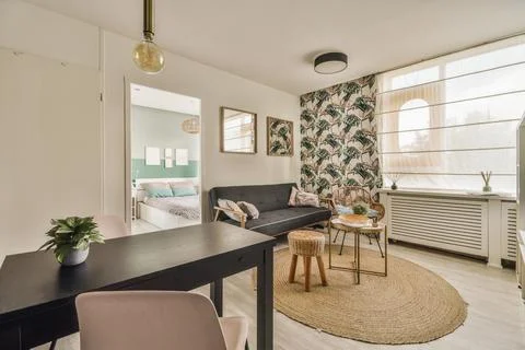 Spacious room with various areas Stock Photos