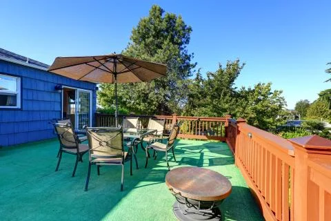 Spacious walkout deck with patio Stock Photos