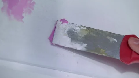 Spackling a small hole in the wall Vídeo Stock 121495748