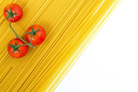 Spaghetti and cherry tomato Stock Photos