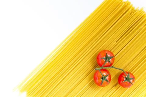 Spaghetti and cherry tomato Stock Photos