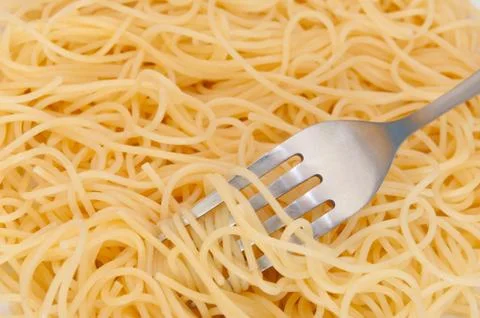 Spaghetti and fork Stock Photos