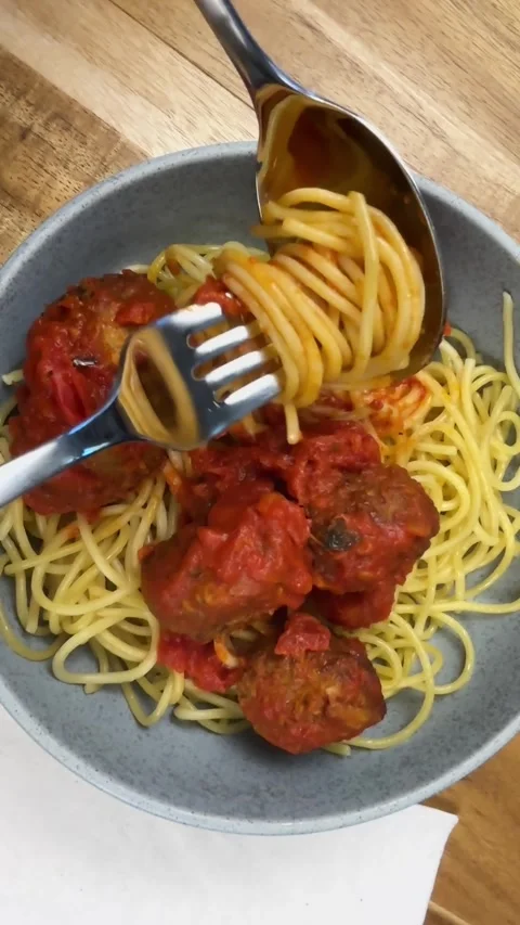 Spaghetti and meatballs with fork, slow Stock Footage 304645895