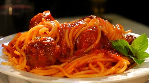 Spaghetti and meatballs. Rotating plate of pasta. CU Stock Footage 102135997