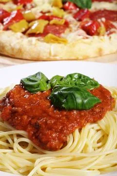 Spaghetti and pizza Stock Photos
