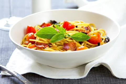 Spaghetti with bacon and dried chilli Stock Photos