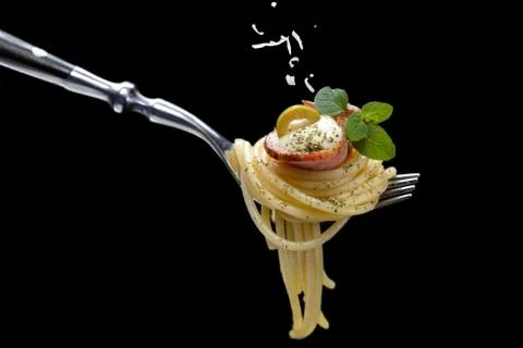 Spaghetti with bacon on fork Stock Photos