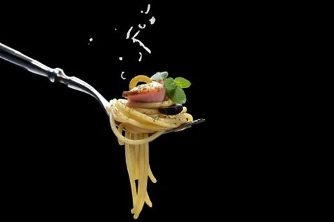 Spaghetti with bacon on fork Stock Photos
