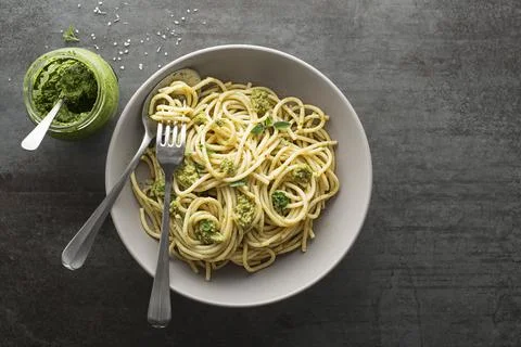 Spaghetti with basil pesto Stock Photos