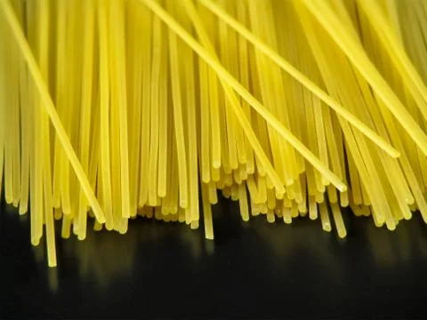 Spaghetti on black background close-up Stock Photos