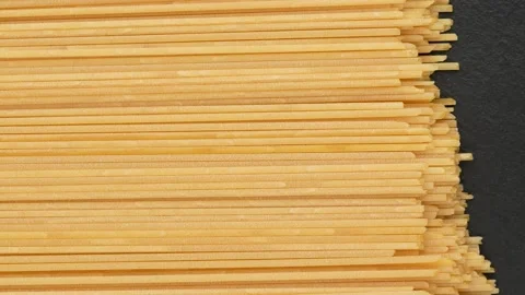 Spaghetti on a black background, dolly shot. Stock Footage 148296864