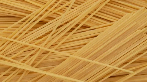 Spaghetti on a black background, top view. Stock Footage 150066272