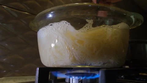 Spaghetti in boiling water. Spaghetti in a transparent pan with boiling water. S Stock Footage 283412187