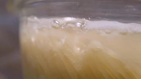 Spaghetti in boiling water. Spaghetti in a transparent pan with boiling water Stock Footage 284174375