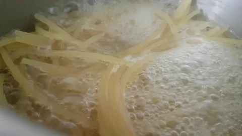Spaghetti boils in a saucepan Stock Footage 88632733
