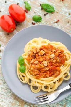 Spaghetti bolognese with basil leave Stock Photos