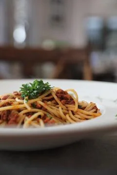 Spaghetti bolognese with beef tometo sauce on wood table , italian food Stock Photos