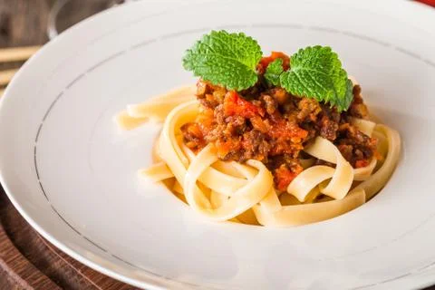 Spaghetti Bolognese on white plate Stock Photos