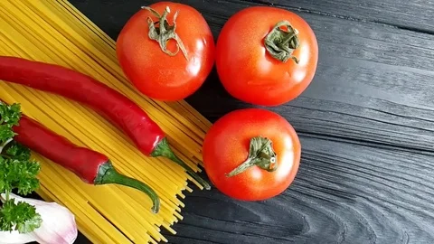 Spaghetti, cheese, red pepper, garlic slow-motion shot Video stock 88632884