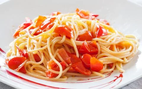 Spaghetti with cherry tomatoes Stock Photos