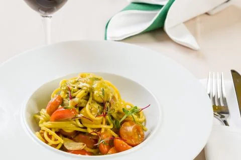 Spaghetti with cherry tomatoes Stock Photos