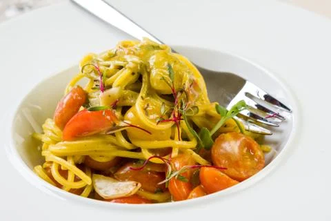 Spaghetti with cherry tomatoes Stock Photos