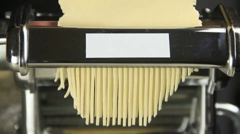 Spaghetti Coming Out Of Pasta Maker Stock Footage 40028067