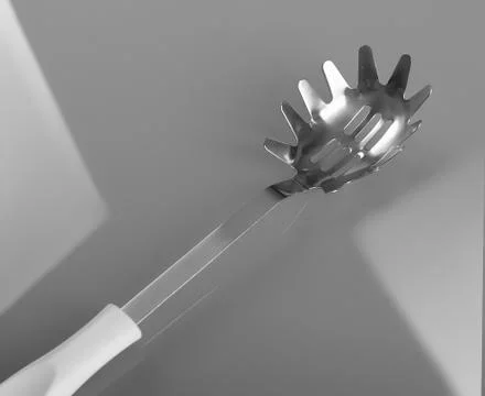 Spaghetti draining utensil Stock Photos