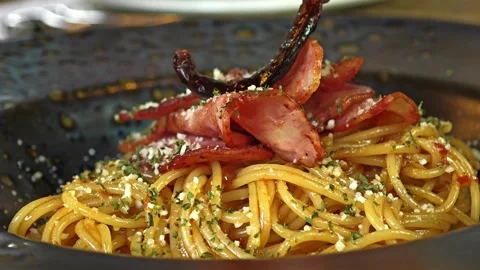 Spaghetti with Dried Chili and Crispy Bacon. Stock Footage 310947019