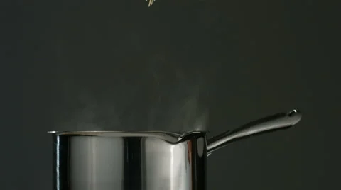 Spaghetti is dropped into boiling water, slow motion Stock-Footage 61674783