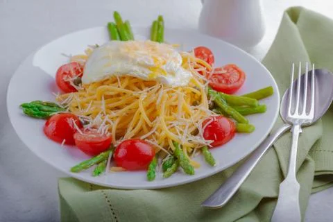 Spaghetti with egg and vegetables Stock Photos